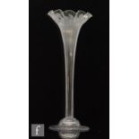 A large 19th Century table centre epergne with a domed foot and a tall flared trumpet with wave rim,