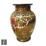 A large early 20th Century Zsolnay Pecs vase decorated with a cockerel amidst pink flowers and