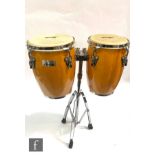 XDrum Conga Set Eco 9 inch and 10 inch, hardwood body with a chrome tripod stand.