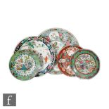 A collection of Chinese/Japanese porcelain dishes, to include famille rose and famille verte