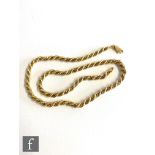 An 18ct yellow and white gold rope twist chain terminating in lobster clasp, length 42cm, weight