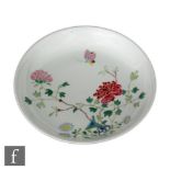 A Chinese famille rose dish, Jiangqing seal mark (1796-1820), the circular form dish with shallow