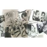A collection of black and white stills featuring male and female stars including Marilyn Monroe,