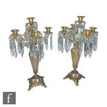 A pair of 20th Century gilt drop lustres with tapering baluster columns on pierced open bases,
