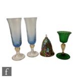 A pair of contemporary Venetian champagne glasses by Vecchia Murano of slender wrythen fluted form