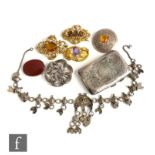 Three 19th Century gilt metal stone set brooches with three further brooches, a silver cigarette