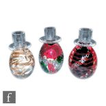 A set of three Venetian glass candlesticks by Vecchia Murano of ovoid form with flat rimmed