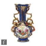 A late 19th Century vase of globe and shaft form decorated with two cartouche panels of flowers