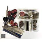 A quantity of assorted Meccano parts, to include wheels, perforated strips, girders, brackets,