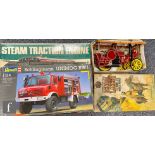 A collection of plastic model kits all started or built to include Bandai 8026 1:16 scale steam