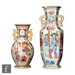 Two 19th Century Chinese Canton famille rose vases, the first of hexagonal baluster form flanked