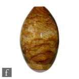 A late 20th century studio glass vase of ovoid form internally decorated with a cinnamon and