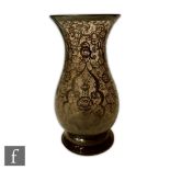 A mid 20th Century Venetian Murano glass vase of footed baluster form decorated with silver floral