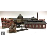 A collection of HO gauge plastic and cardboard buildings and scenic accessories, S/D.