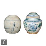 Two Chinese Song Dynasty style jars and covers of ovoid form surmounted by domed cover, with
