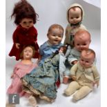 A collection of six composition and hard plastic dolls by Pedigree, Reliable and similar,