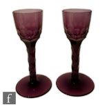 A pair of late 19th century amethyst cardinal glasses, facet stemmed in 18th century style, height