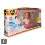 A 1970s Pedigree Sindy Active Sindy doll with original box complete with posing stand and free