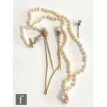 A single row of graduated fresh water pearls terminating in diamond set clasp, length 44cm, with a