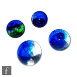 A set of four Caithness Limited Edition Element paperweights comprising earth, air, fire and
