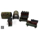A collection of Bing Table Top Railway tinplate accessories, to include two station buildings, an