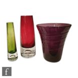 A Whitefriars amethyst glass vase of flaring cylindrical form with applied spiral ribbon trail,