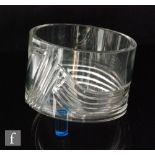A contemporary Czech cut crystal glass bowl of tall cylindrical form cut with mitre cut wave