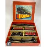 An O gauge Hornby No. 41 Passenger Set to include an 0-4-0T BR black 82011 clockwork locomotive, two