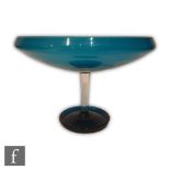 A post war Riihimaki Harlekiini glass pedestal bowl designed by Nanny Still, the shallow sapphire