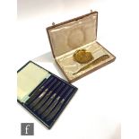 A 20th Century French gilt bronze floral pin dish and a letter opener with floral raised