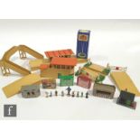 A collection of OO gauge model railway accessories, to include five Dinky 051 Station Staff in