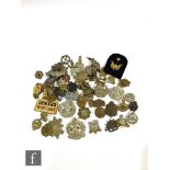 A collection of military cap badges, various regiments, modern badges, coins etc. (qty)