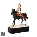 A Royal Worcester model of The Royal Horse Guards (The Blues) modelled by Doris Lindner as a