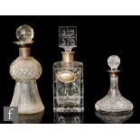 A late 19th Century cut glass decanted of thistle formed with a facet cut stopper, the neck with