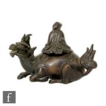 A Chinese late Qing Dynasty (1644-1912) bronze incense burner, modelled as a recumbent Qilin, it