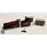 An O gauge Bassett-Lowke 4-4-0 LMS maroon 'Princess Elizabeth' clockwork locomotive and tender, with