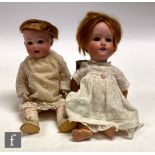 A Schoneau and Hoffmeister bisque head doll, head mould 914, with sleeping blue eyes, open mouth