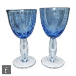 A pair of Portmerion wine glasses internally decorated with vertical bands of controlled air bubbles
