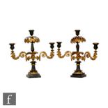 A pair of 19th Century French Empire style gilt metal bronze twin branch candelabra drop lustres,