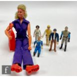 A collection of action figures, comprising Bionic Woman Jaime Sommers doll with bag and shoes,