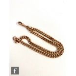 A 9ct rose gold uniform curb link single Albert chain, converted to a bracelet terminating in swivel