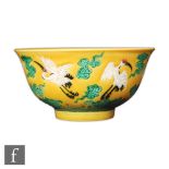 A Chinese yellow-ground 'Cranes' bowl, Yongzheng (1722-35) six-character mark, but later, raised