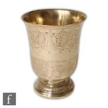 A French silver pedestal beaker, circular spread foot below inverted bell shaped body with part