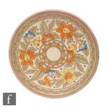 A 1930s Charlotte Rhead for Crown Ducal charger decorated in the 5983 Ankara pattern with