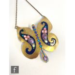 A large Art Nouveau style gilt metal necklace of butterfly form inset with cabochon stones with