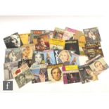 A collection of foreign 7 inch singles to include Charles Aznavour, Richard Anthony, Michelle