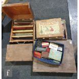 A collection of assorted Meccano pieces, mostly housed in wooden boxes, to include plates, small