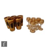 A set of five 19th Century Bohemian crystal glass tumblers of slice cut form with applied glass oval
