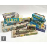 A collection of assorted plastic model kits, mostly scenic accessories for HO gauge model railway,