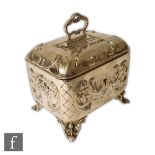 A 19th Century Austrian silver box raised on four pierced scroll feet with part foliate scroll